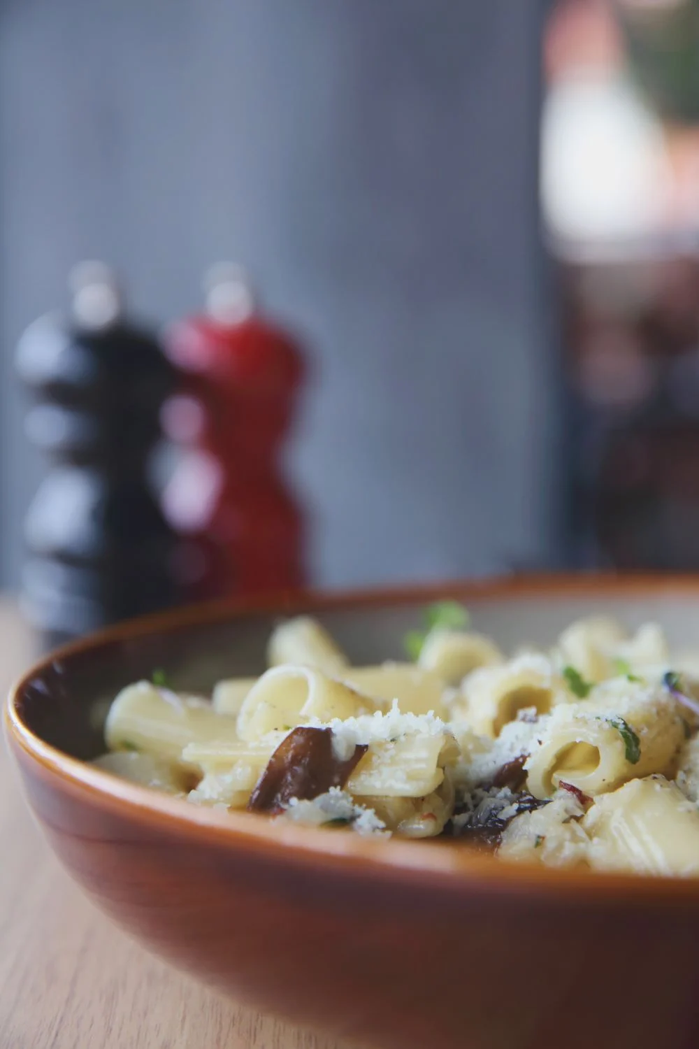 Pasta with Parmesan cheese and dark mushrooms